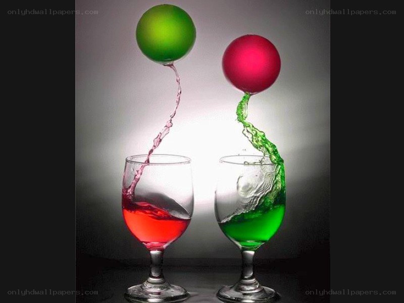 Colorful liquid splashing in glasses