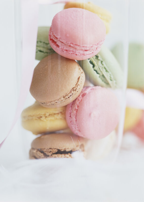 Colorful macarons in a glass