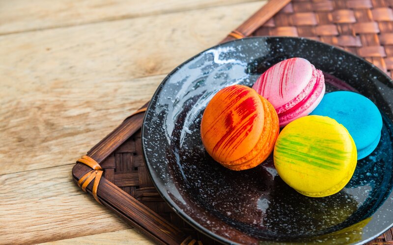 Colorful Macarons on Plate — Black