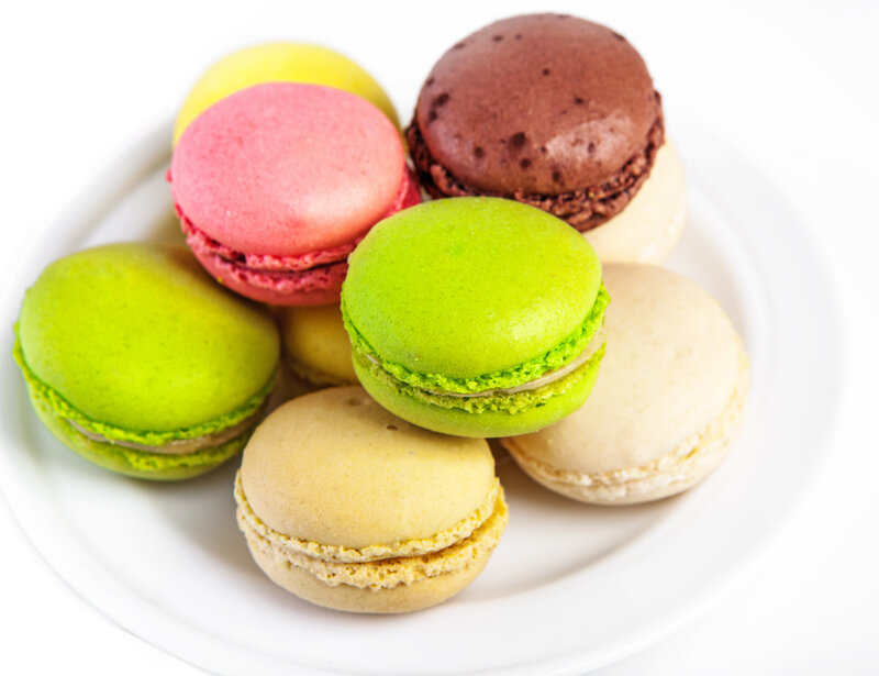 Colorful Macarons on Plate — Green, Neutral