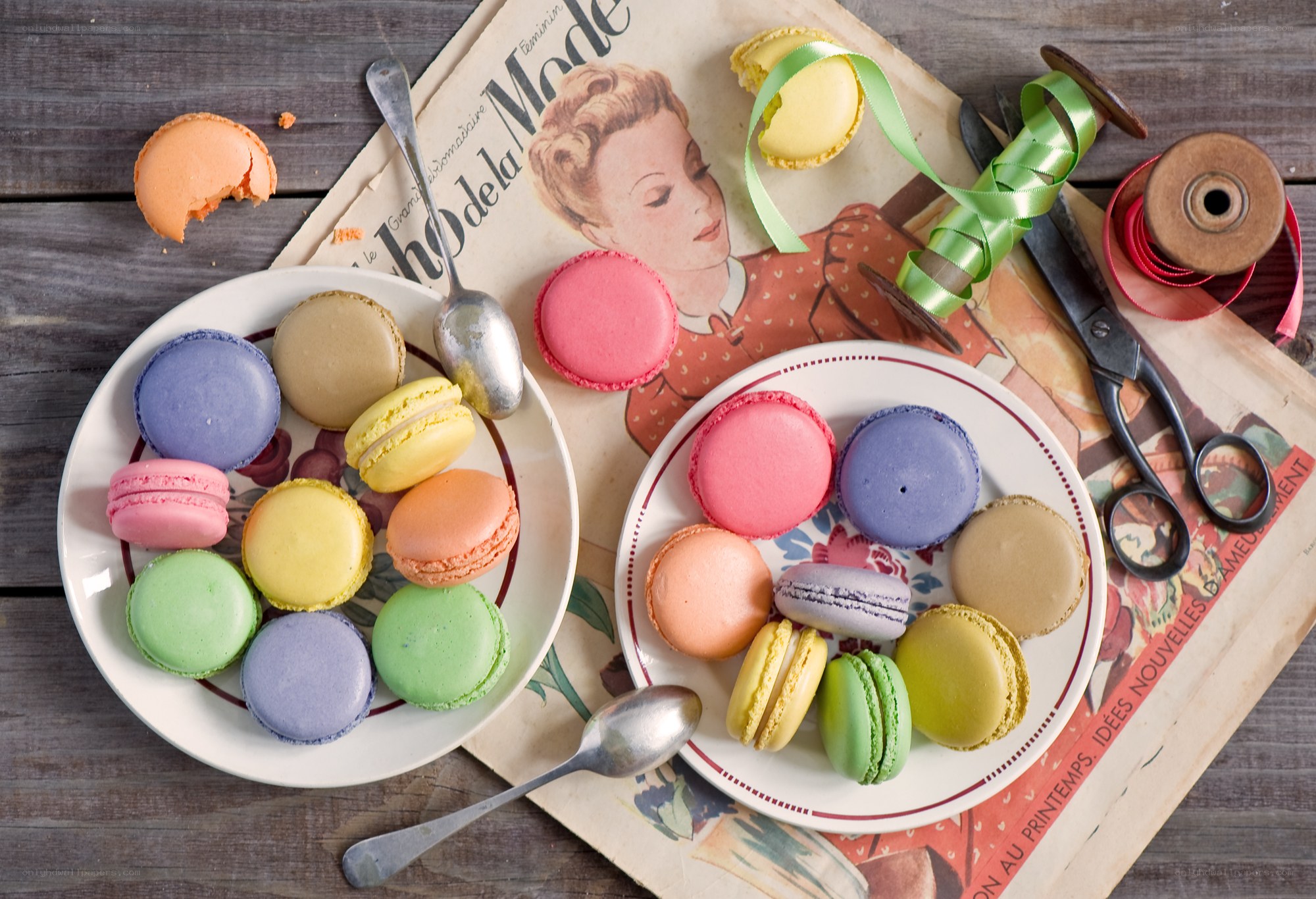 Colorful macarons on vintage magazine