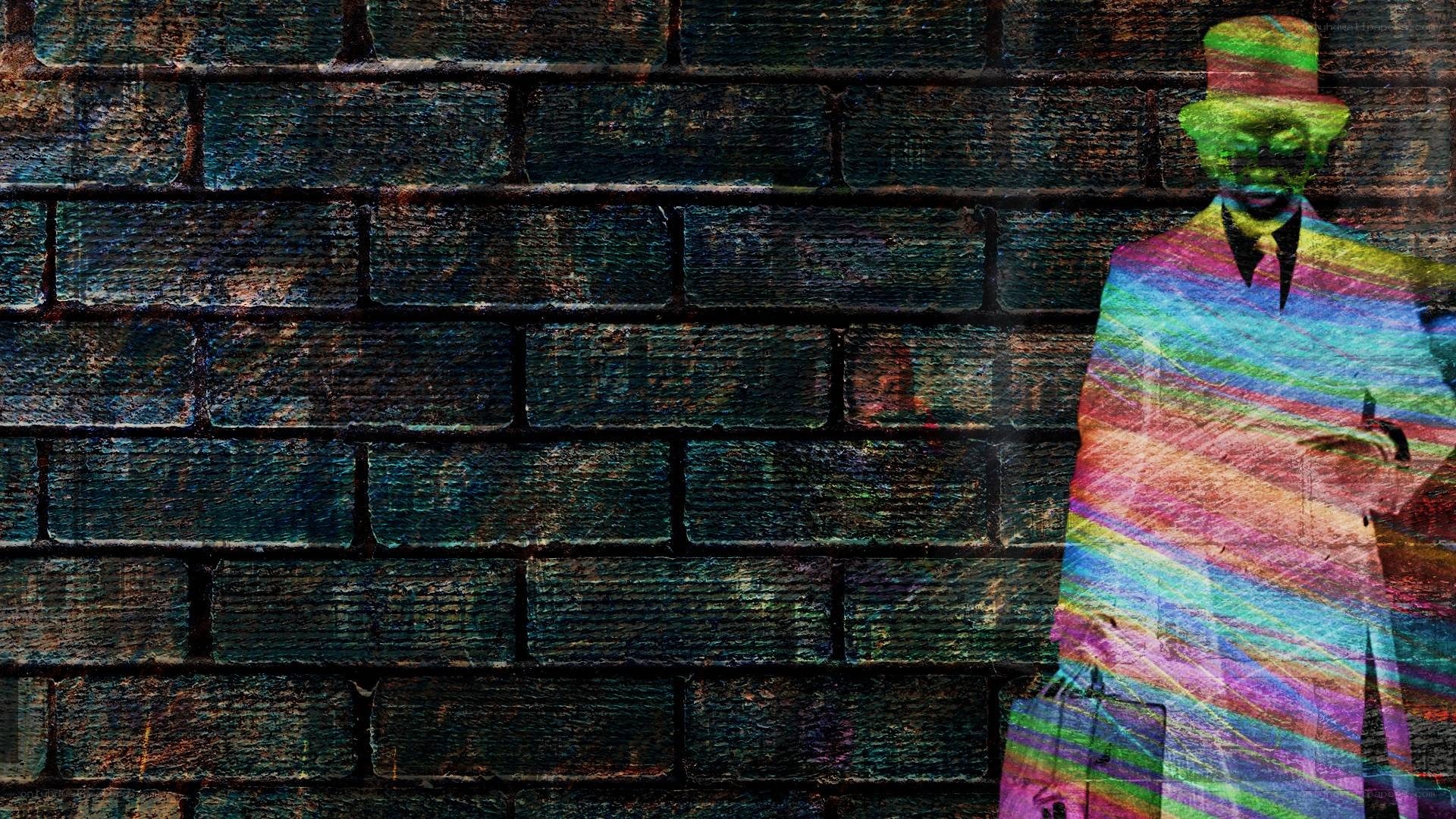 colorful man on brick wall