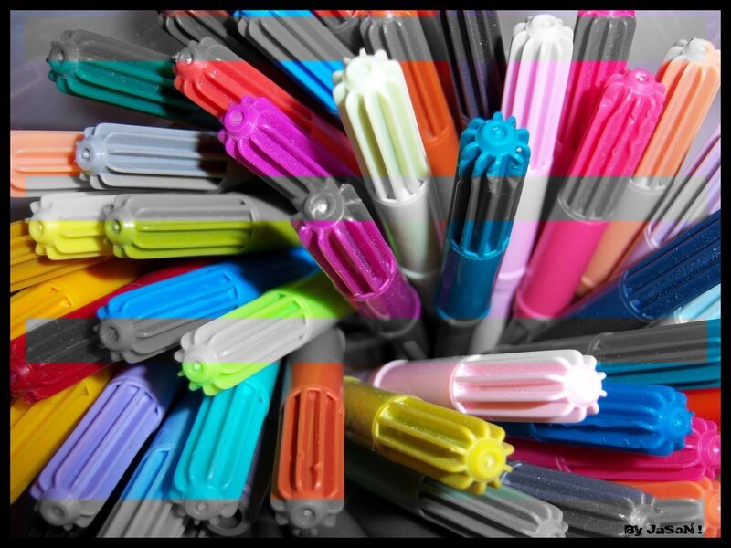 Colorful markers in a container
