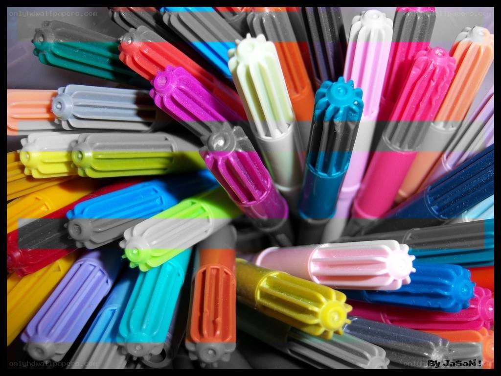 Colorful markers in a container