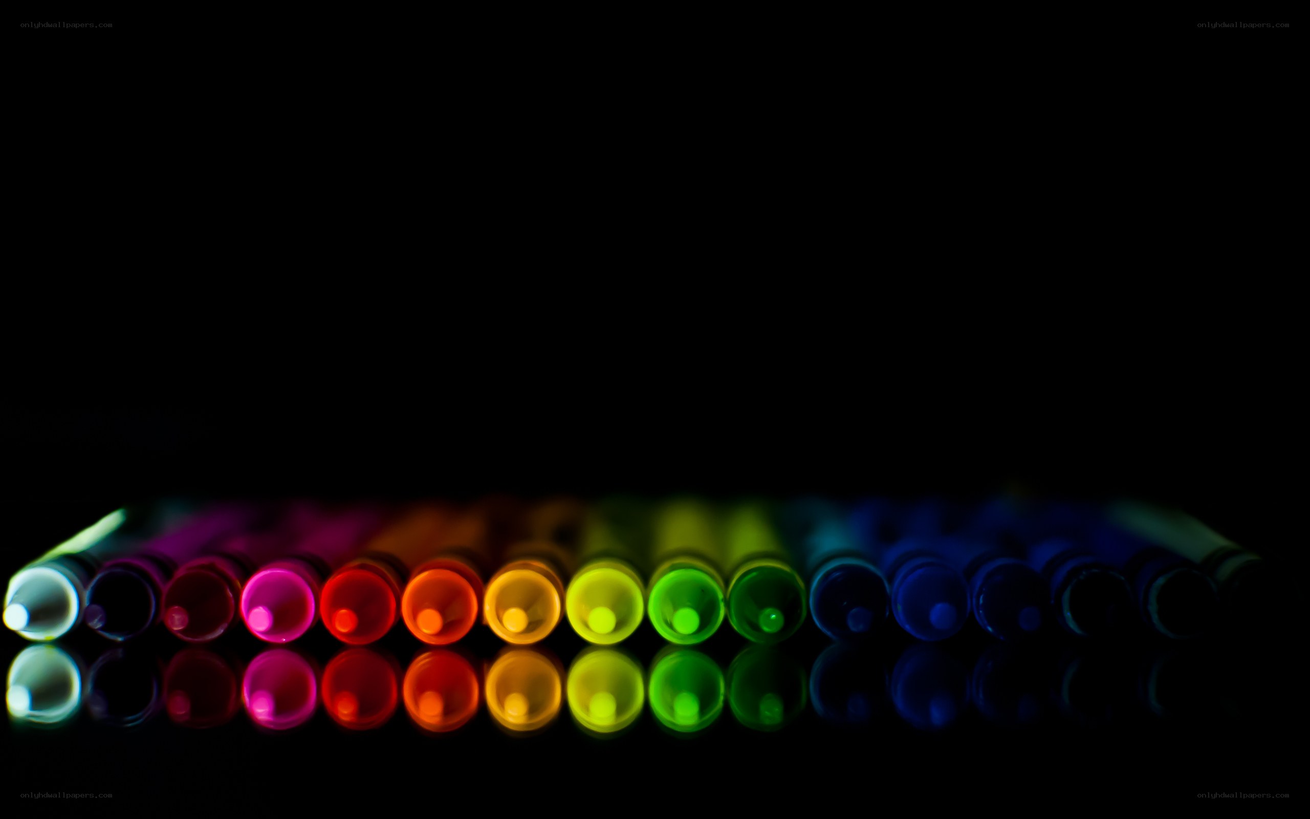 Colorful markers in a row
