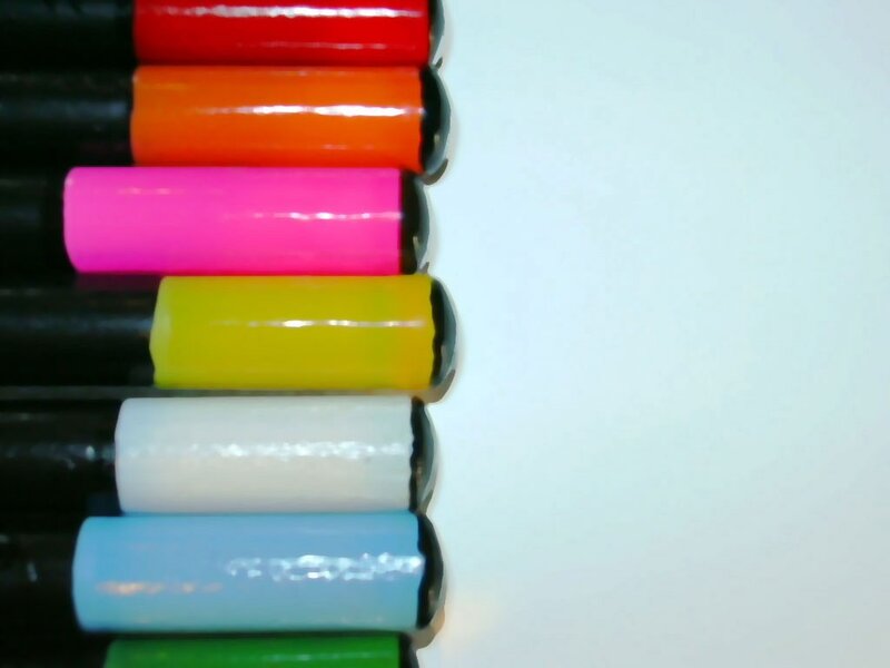 colorful markers in a row