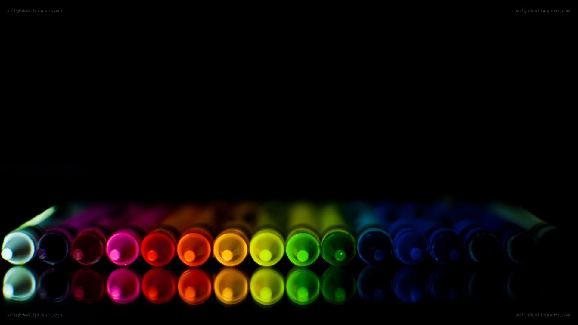 Colorful markers in a row