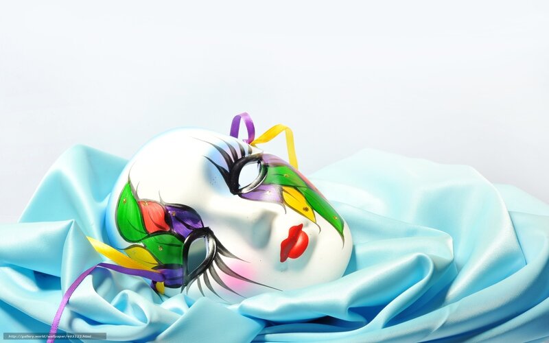 colorful mask on blue fabric