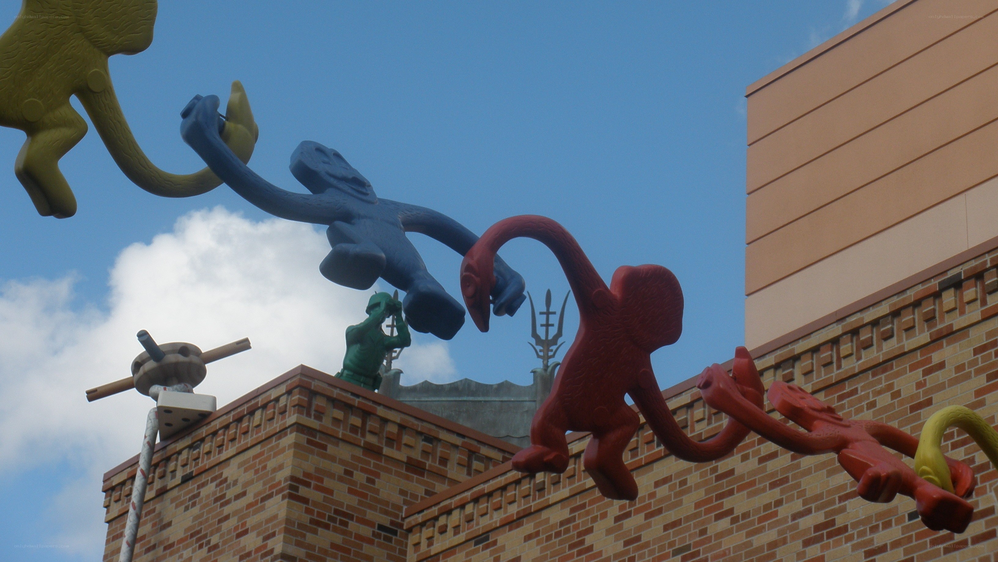 colorful monkey sculptures on building