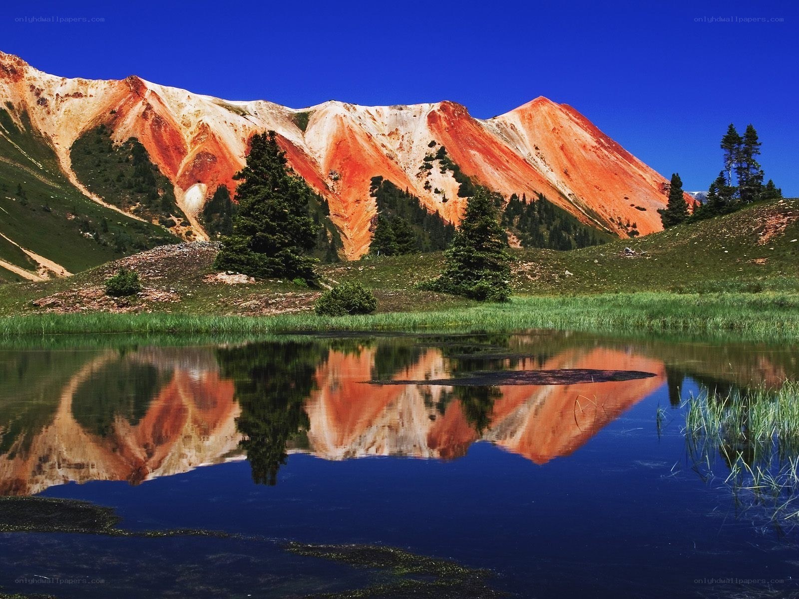 Colorful mountain reflected in lake