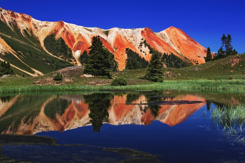 Colorful mountain reflected in lake