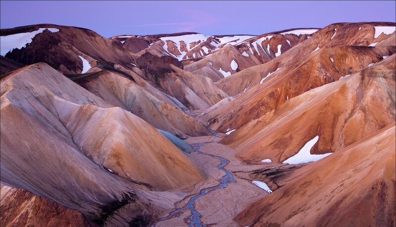 Colorful mountain valley at dusk