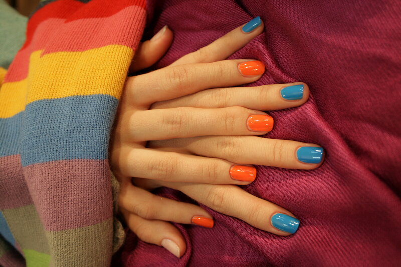 colorful nail polish on hands