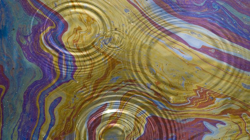 Colorful oil ripples on water