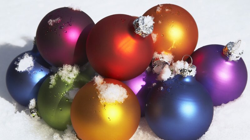 Colorful ornaments in snow
