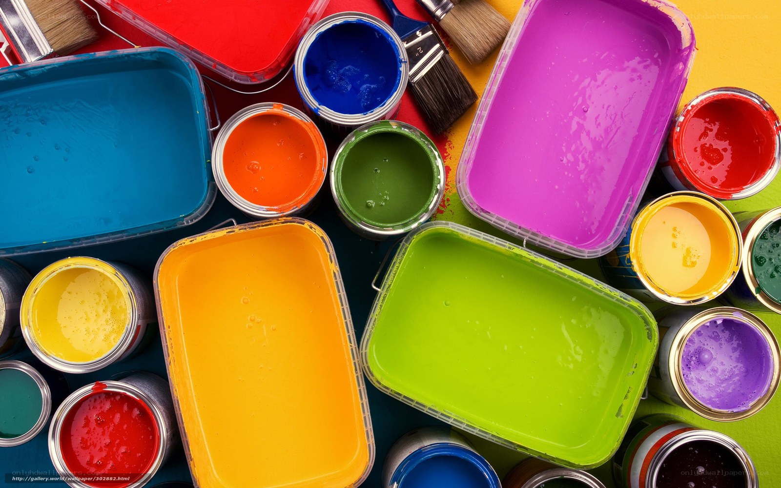 Colorful paint cans and trays