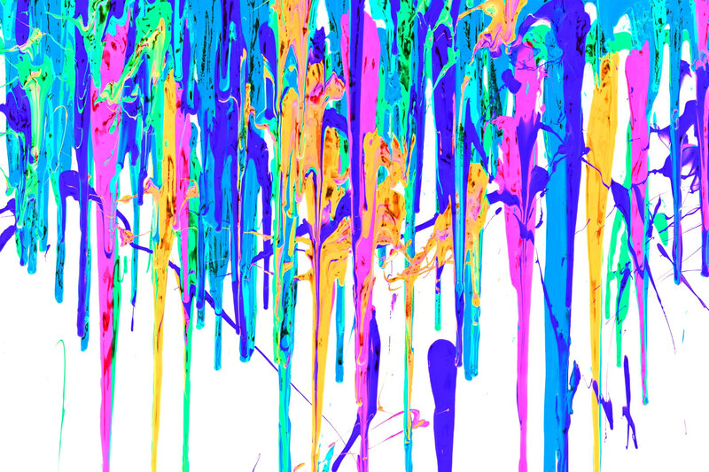Colorful paint drips on white