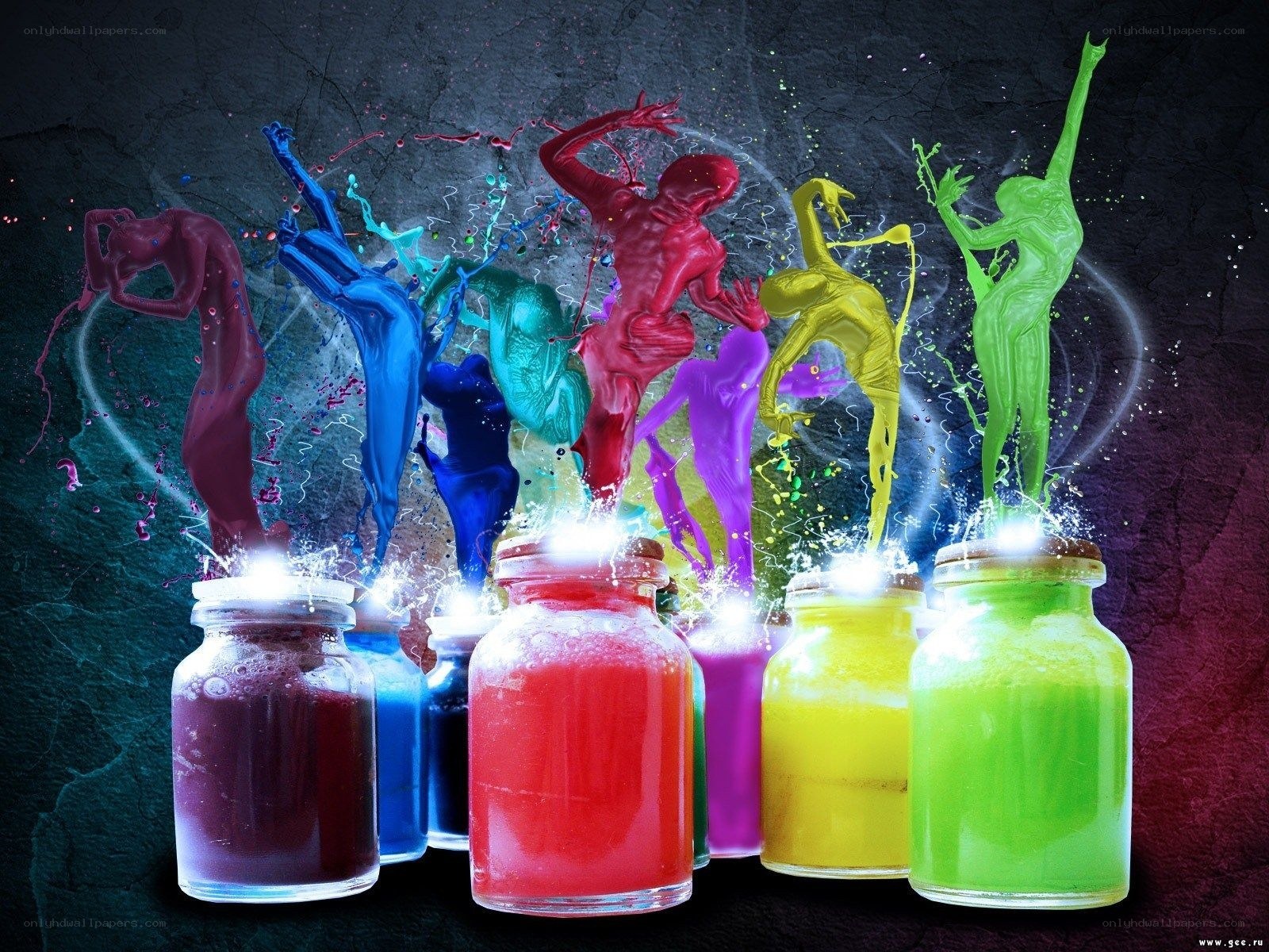 Colorful paint splashes from jars