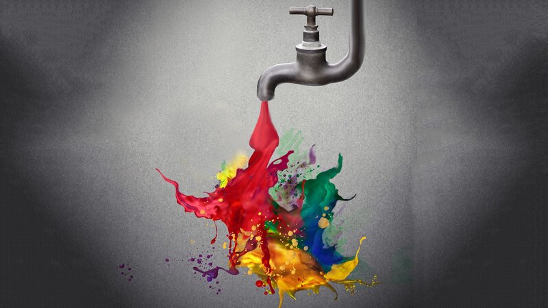Colorful paint splashing from faucet