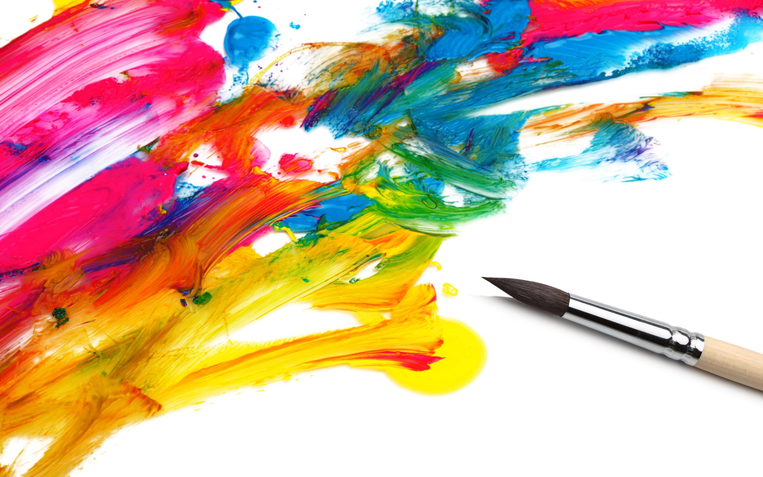 Colorful paint splatters with brush