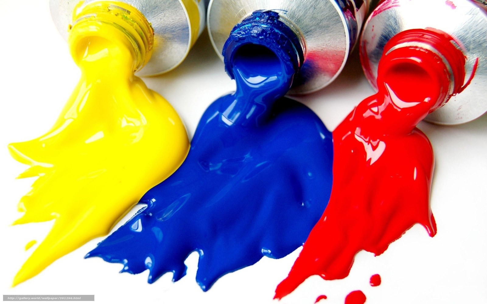 Colorful paint tubes spilling