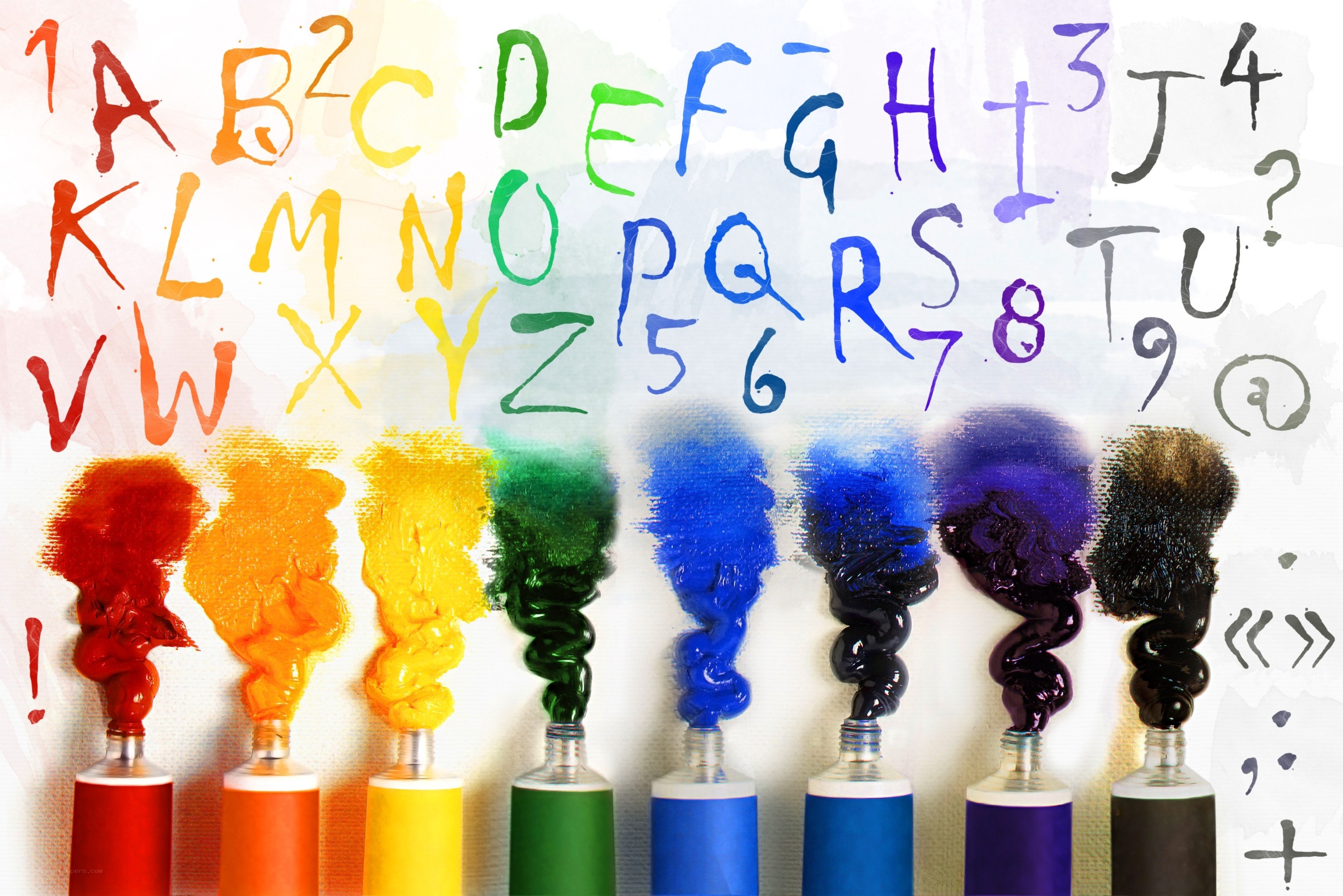Colorful paint tubes with alphabet