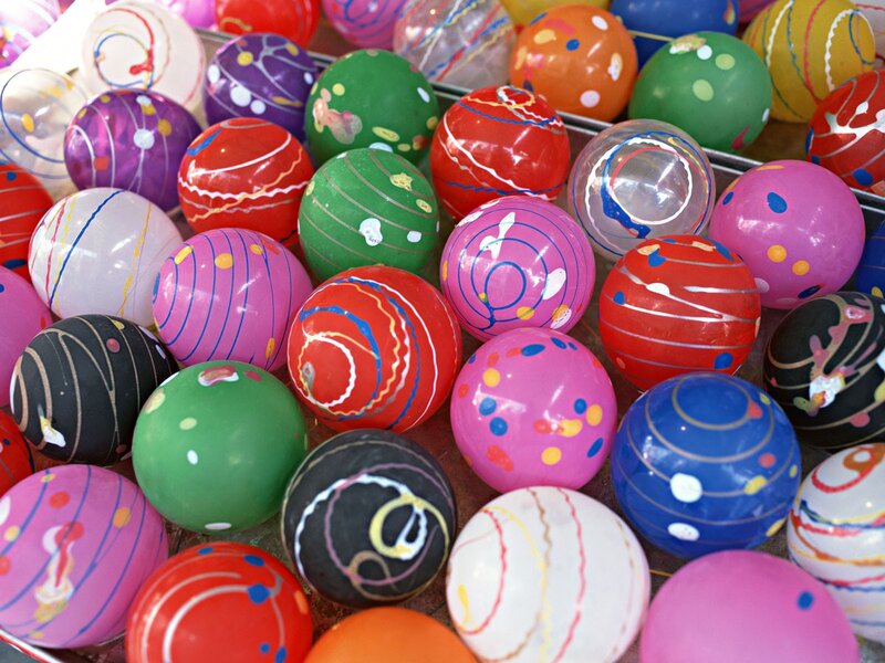 Colorful painted balls in a tray