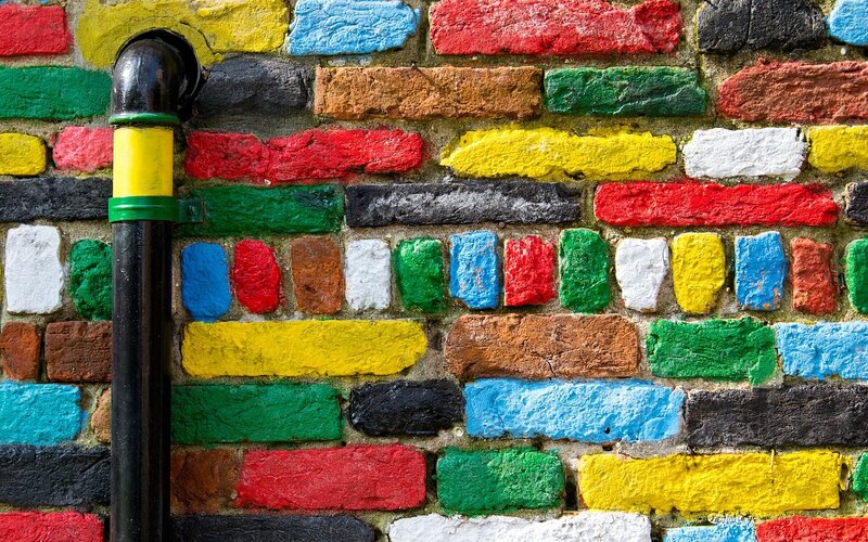 Colorful Painted Brick Wall — Red