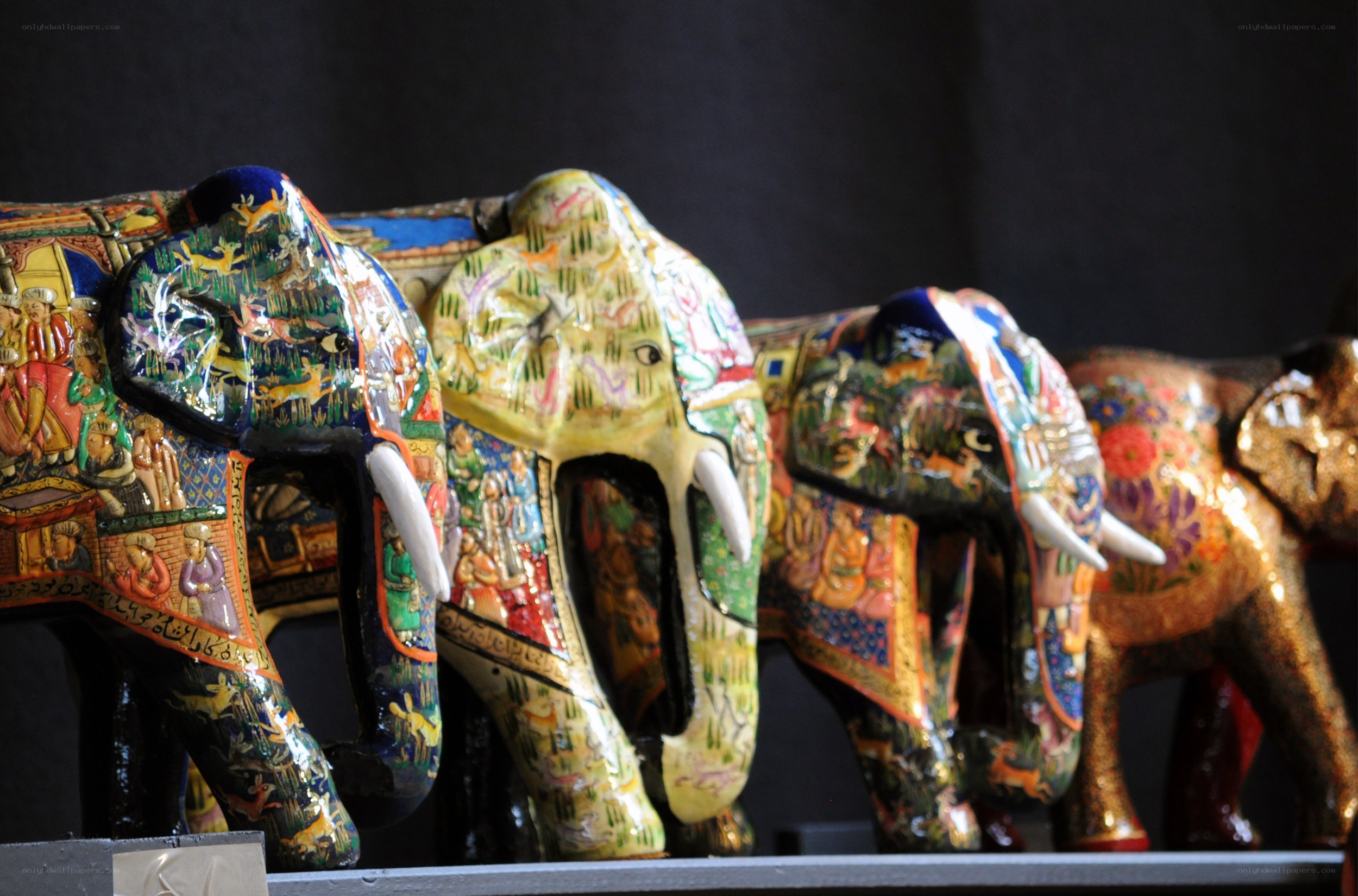 Colorful painted elephant figurines