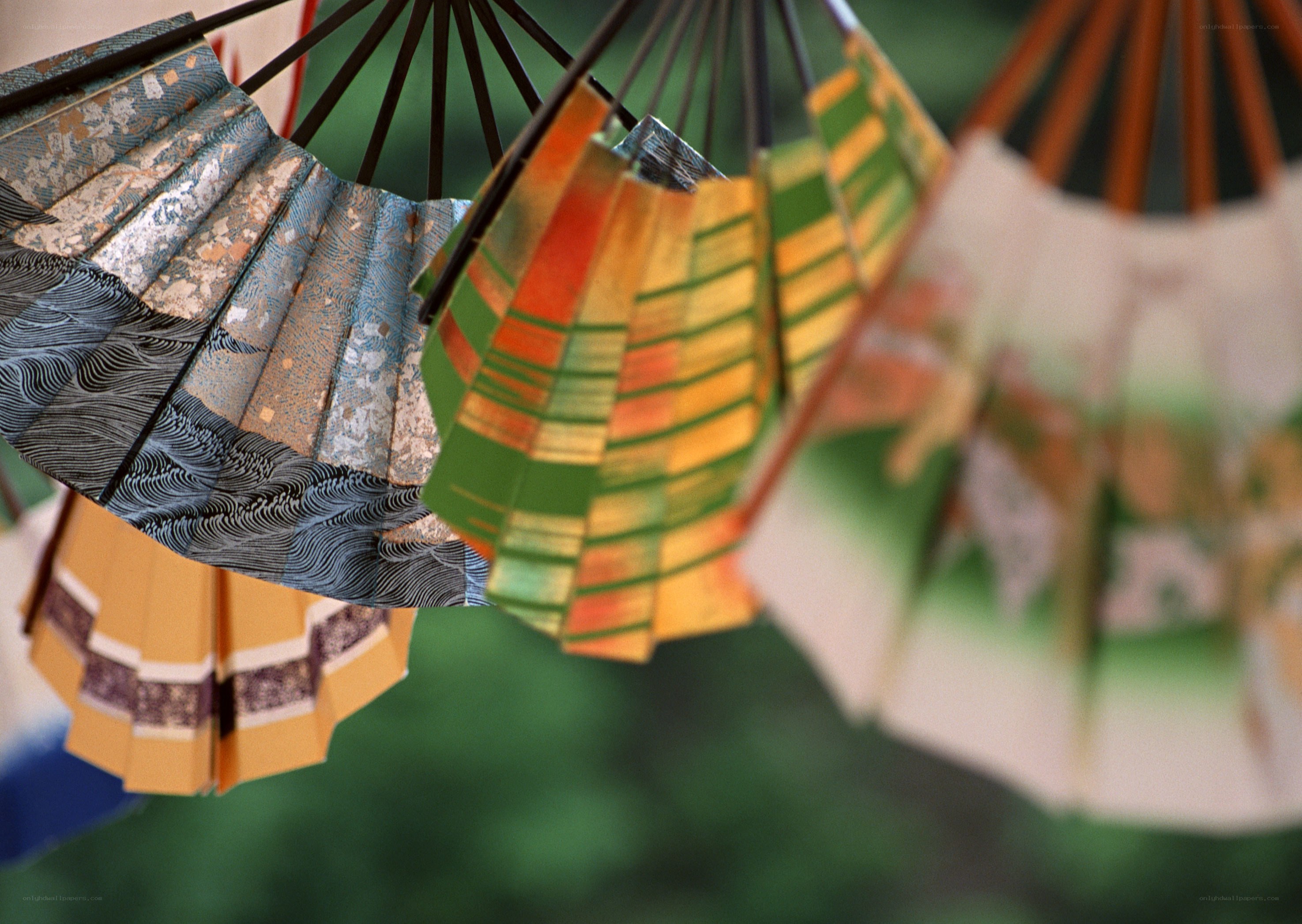 Colorful paper fans hanging