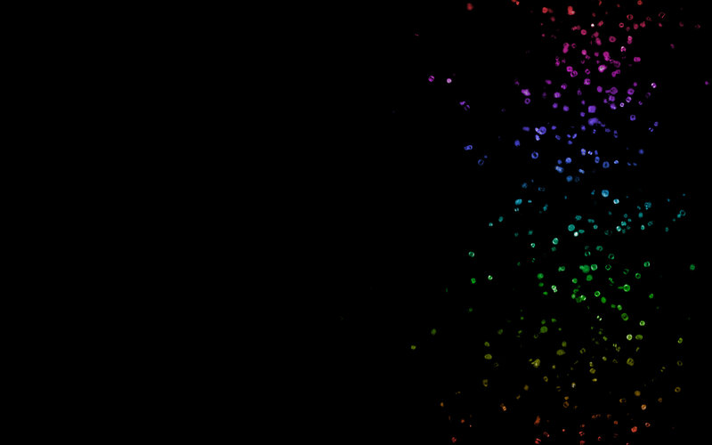 colorful particles on black