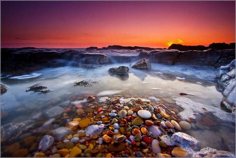 Colorful pebbles at sunset