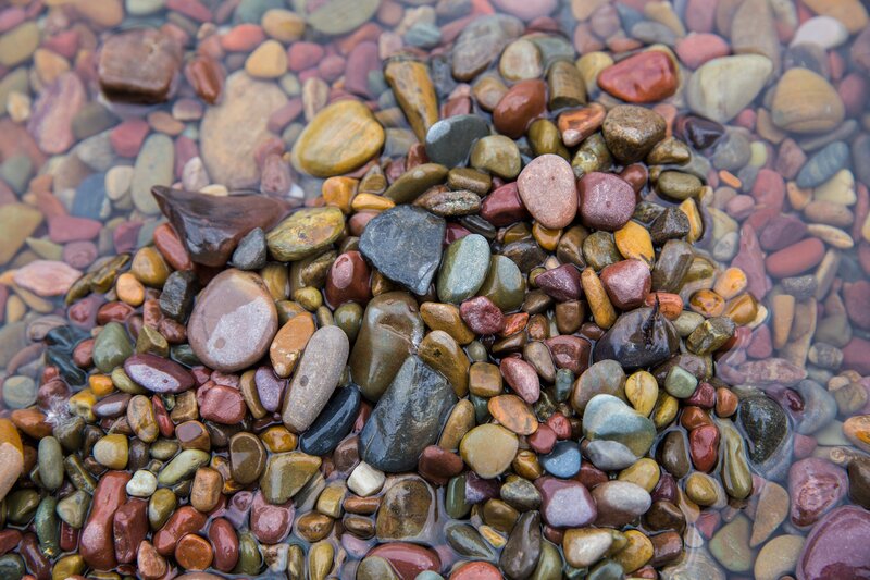 Colorful Pebbles in Water