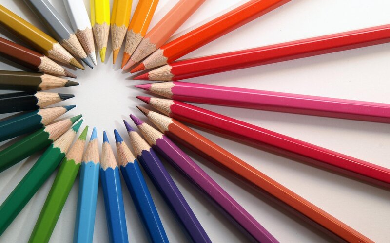 Colorful pencils arranged in a circle