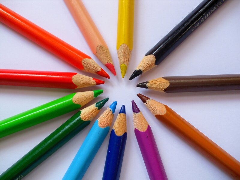 Colorful pencils arranged in a circle