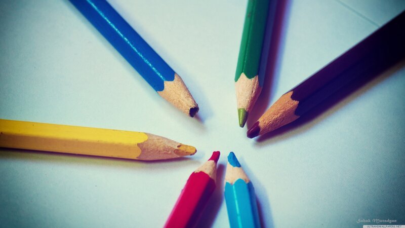 Colorful pencils arranged in a circle