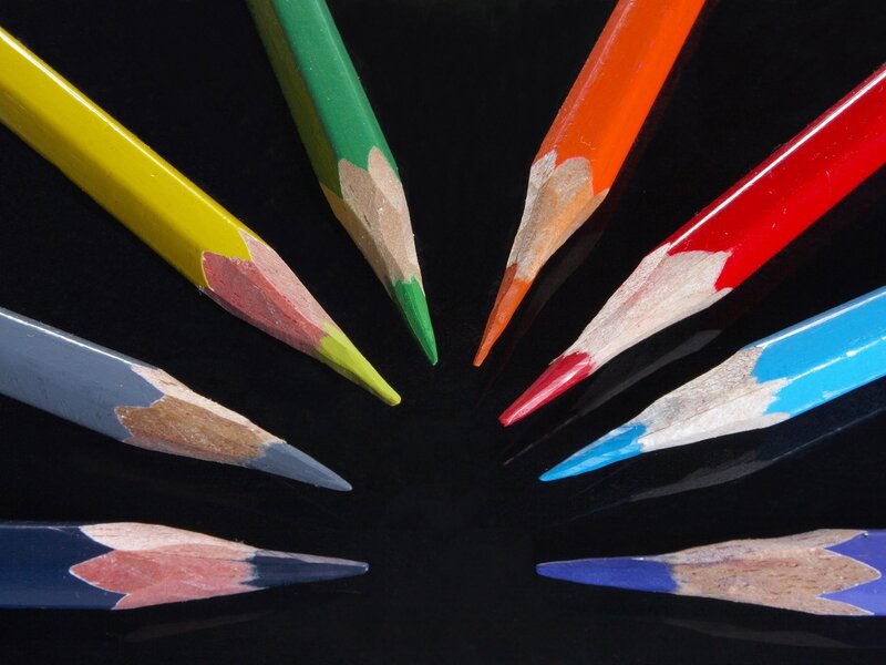 Colorful pencils arranged in a circle