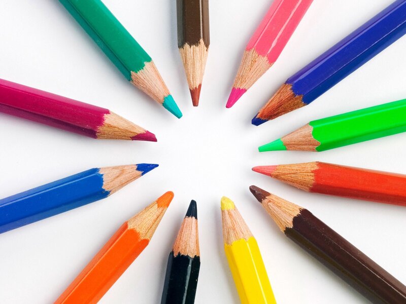 Colorful pencils arranged in a circle