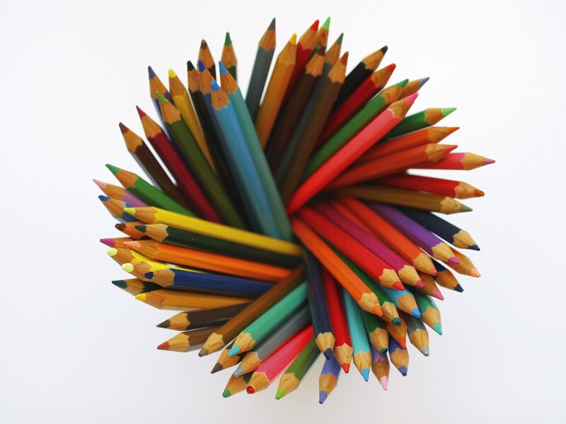 Colorful pencils arranged in a circle