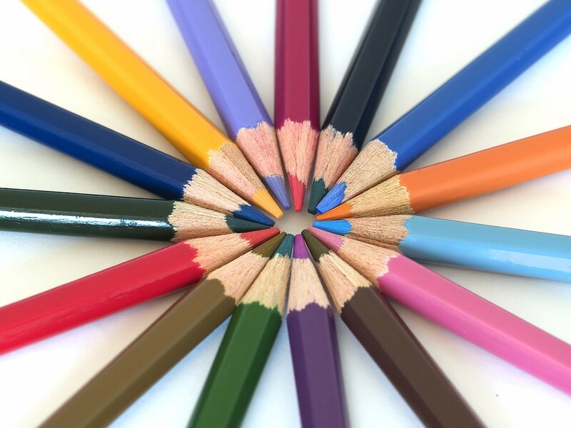 Colorful pencils arranged in a circle