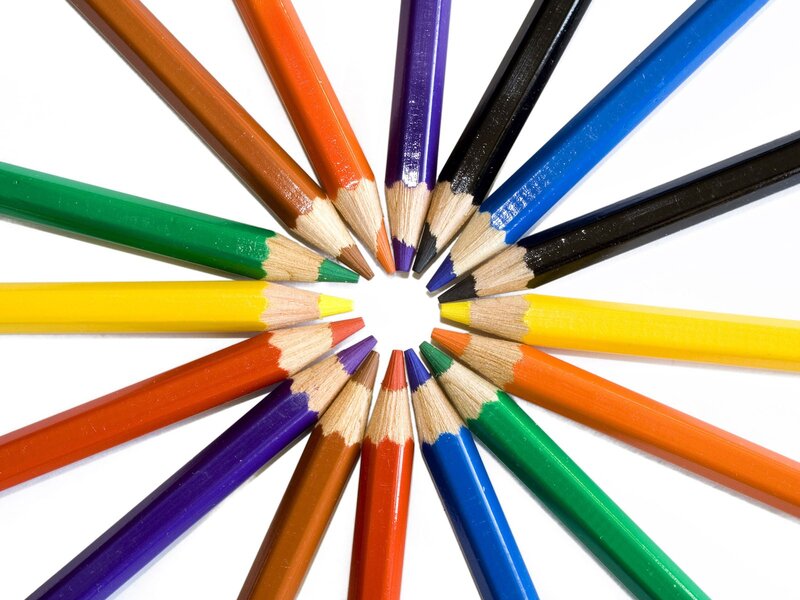 Colorful pencils arranged in a circle