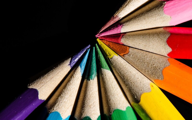 Colorful pencils arranged in a circle