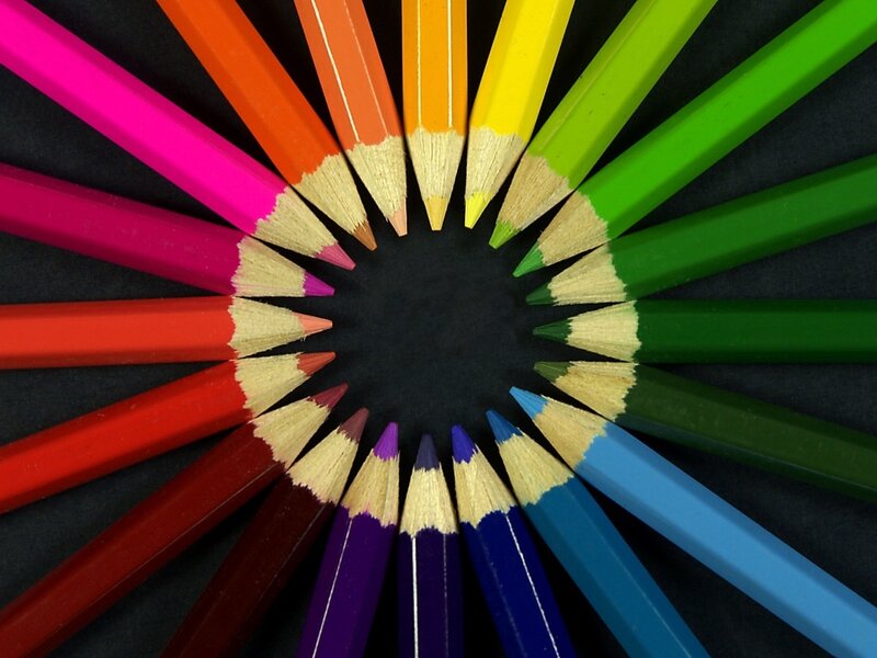Colorful pencils arranged in a circle
