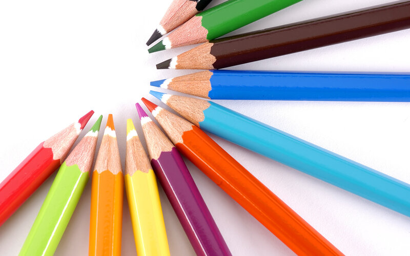 Colorful pencils arranged in a circle