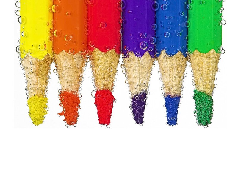 Colorful pencils in water