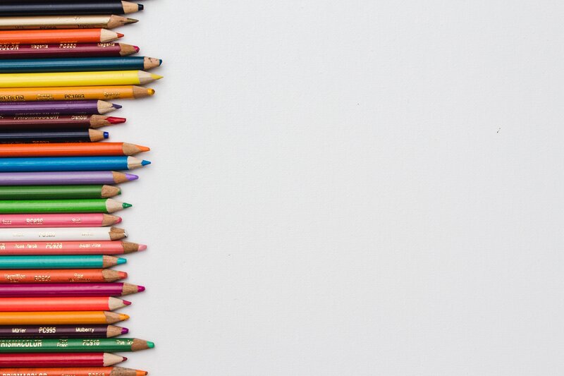 Colorful pencils on white background