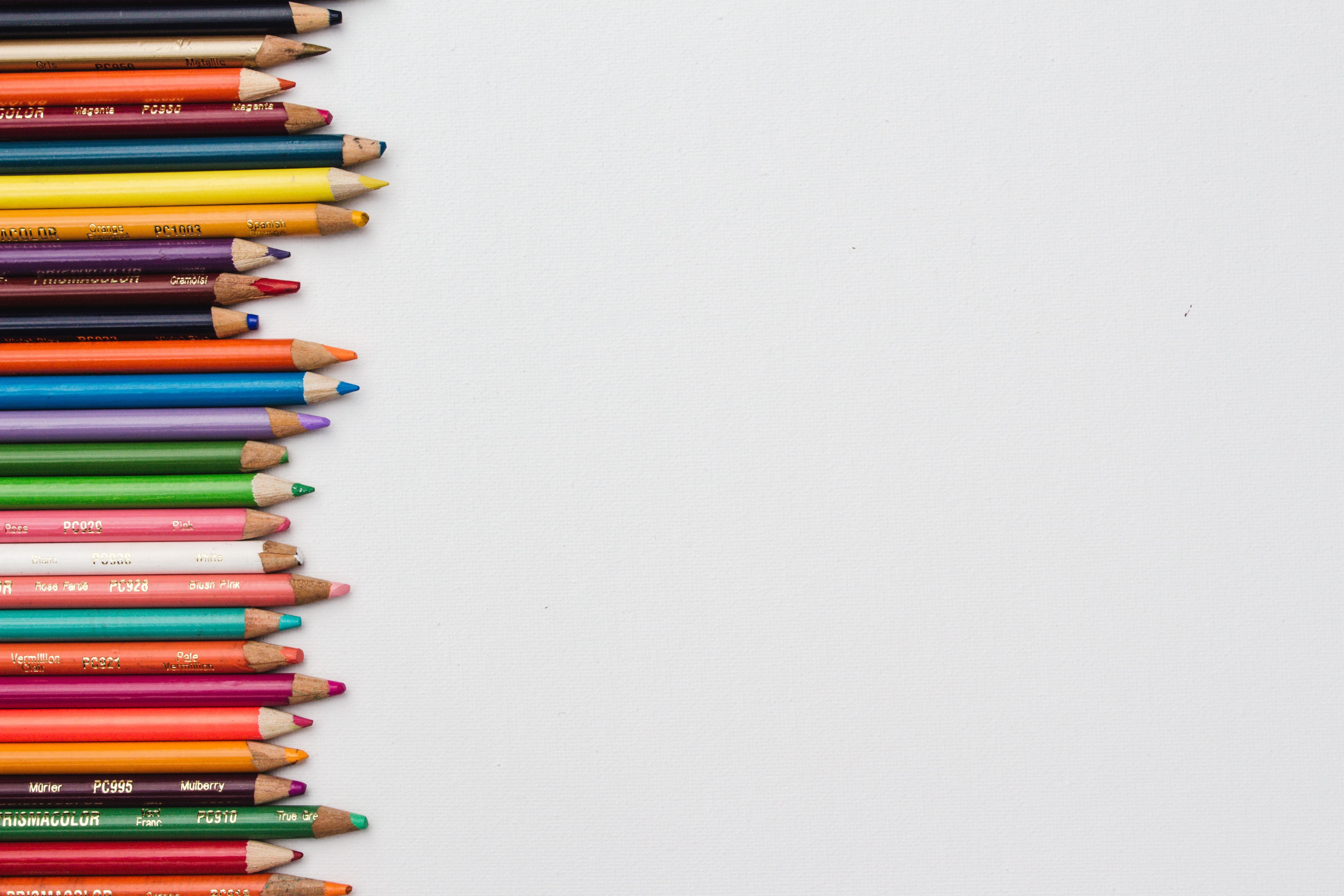 Colorful pencils on white background