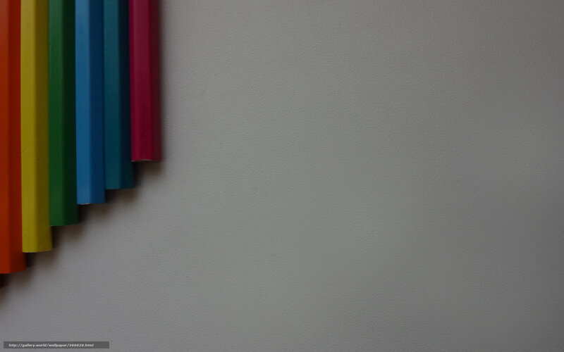 Colorful pencils on white surface