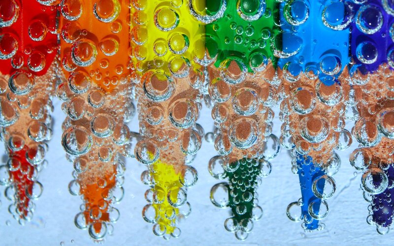 Colorful Pencils Underwater — Red