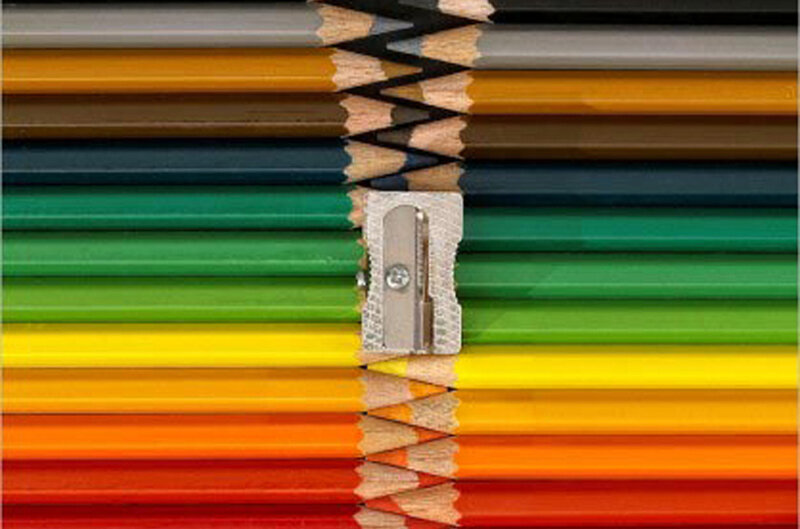Colorful pencils with sharpener